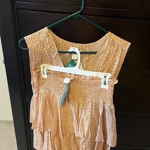 H&M shirt and blouse.